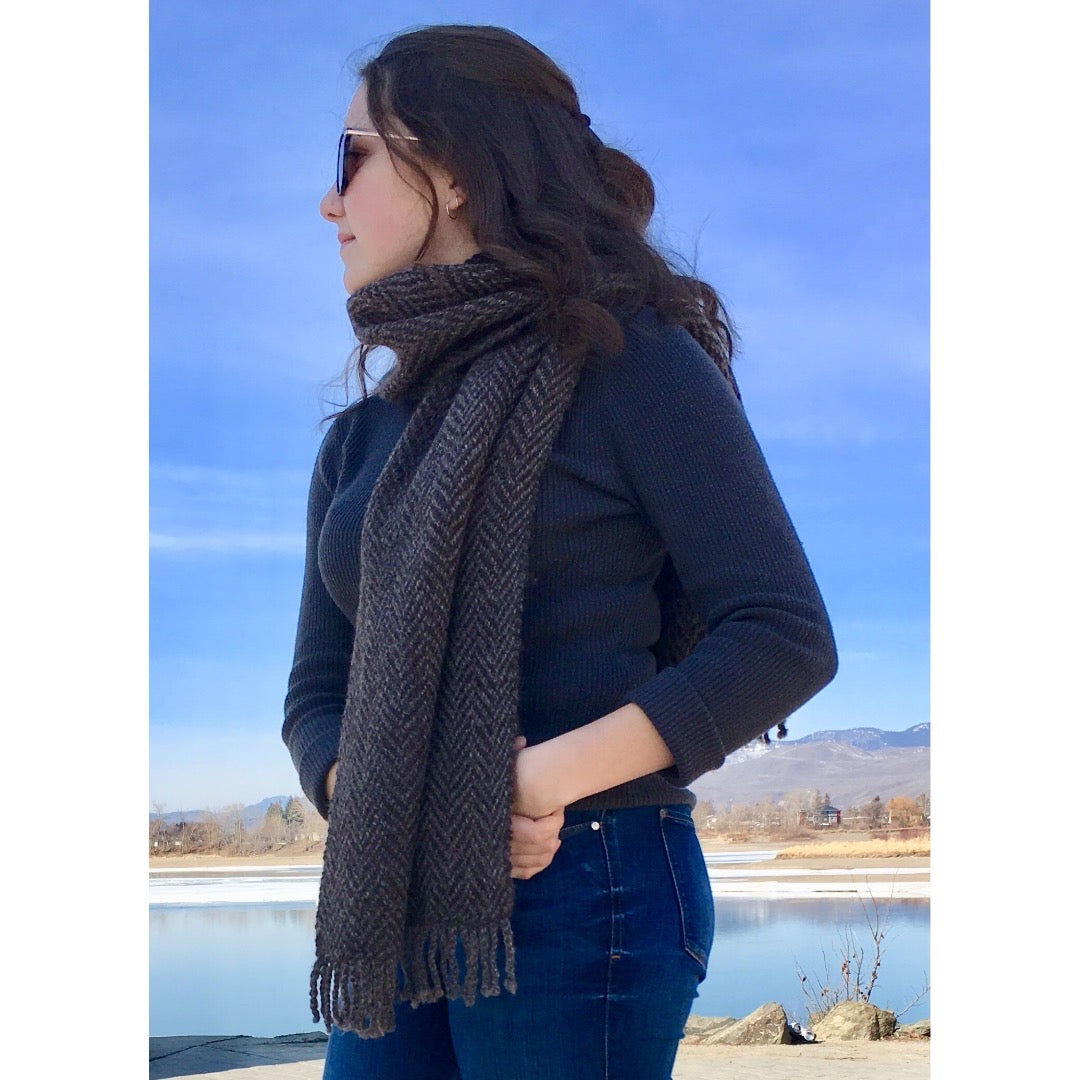 Model wearing Herring Bone scarf around her neck