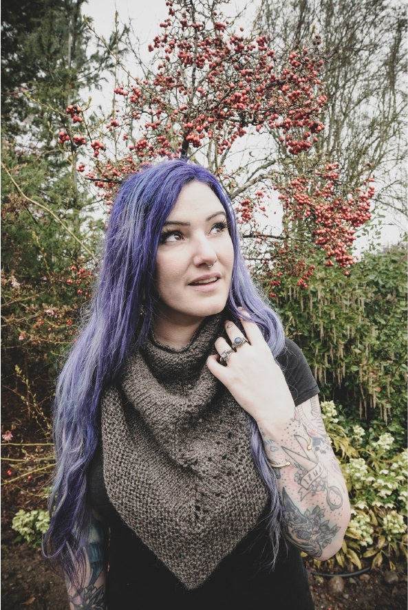 Model wearing This Comfort Shawl as a bandana