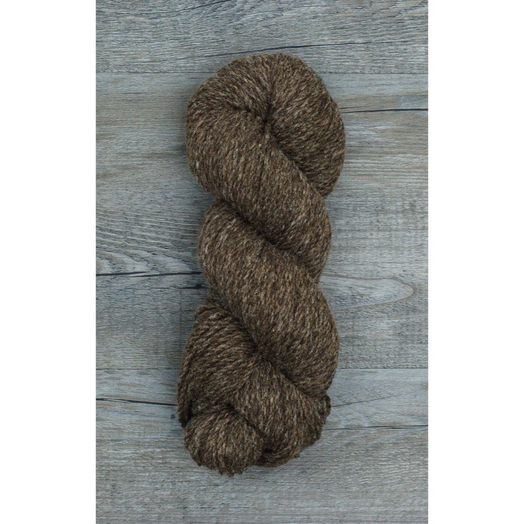 One hank of deep dark brown CVMco worsted weight yarn