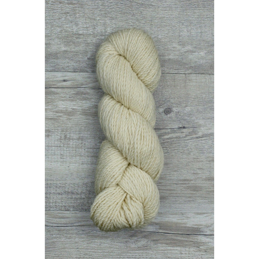 One hank of light beige CVMco worsted weight yarn