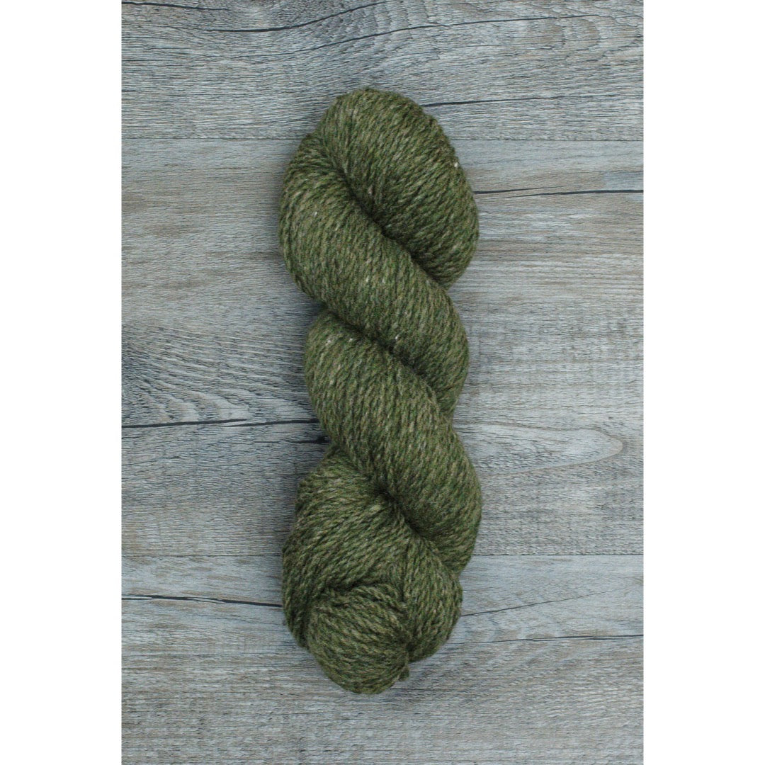 One hank of dark green CVMco worsted weight yarn