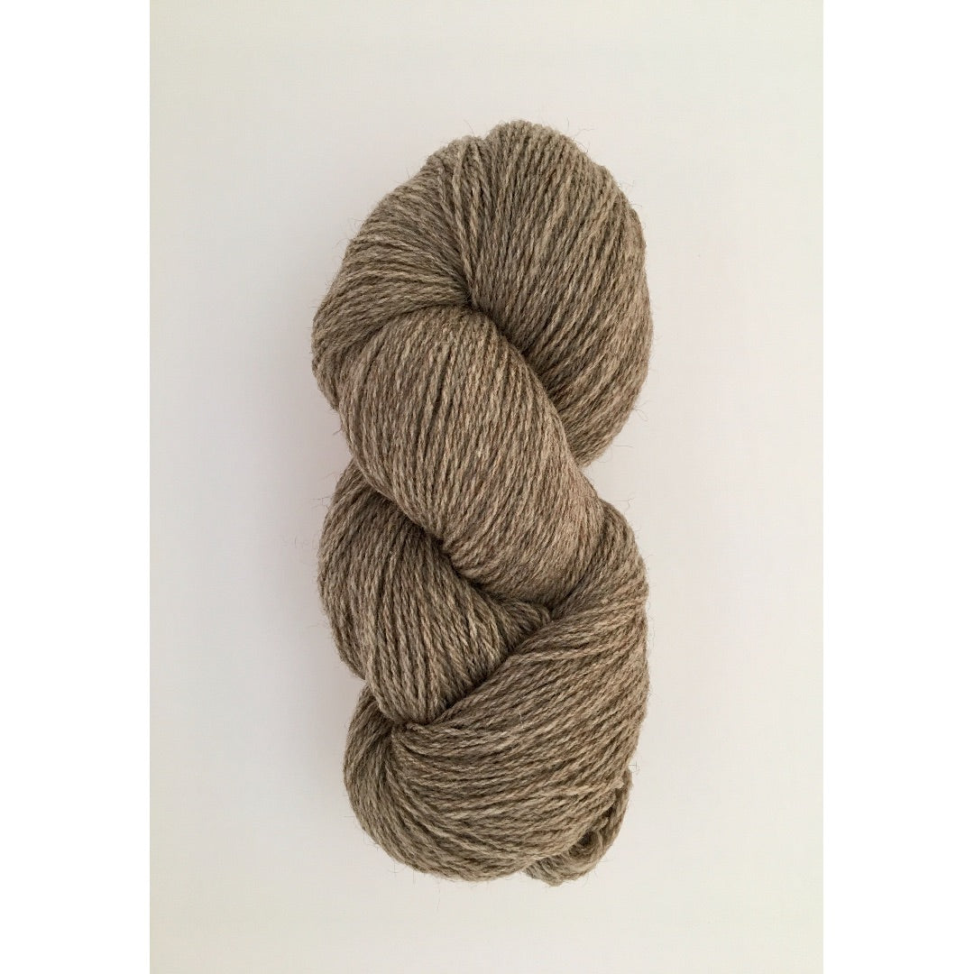 One ginger brown coloured hank of Copaca DK yarn