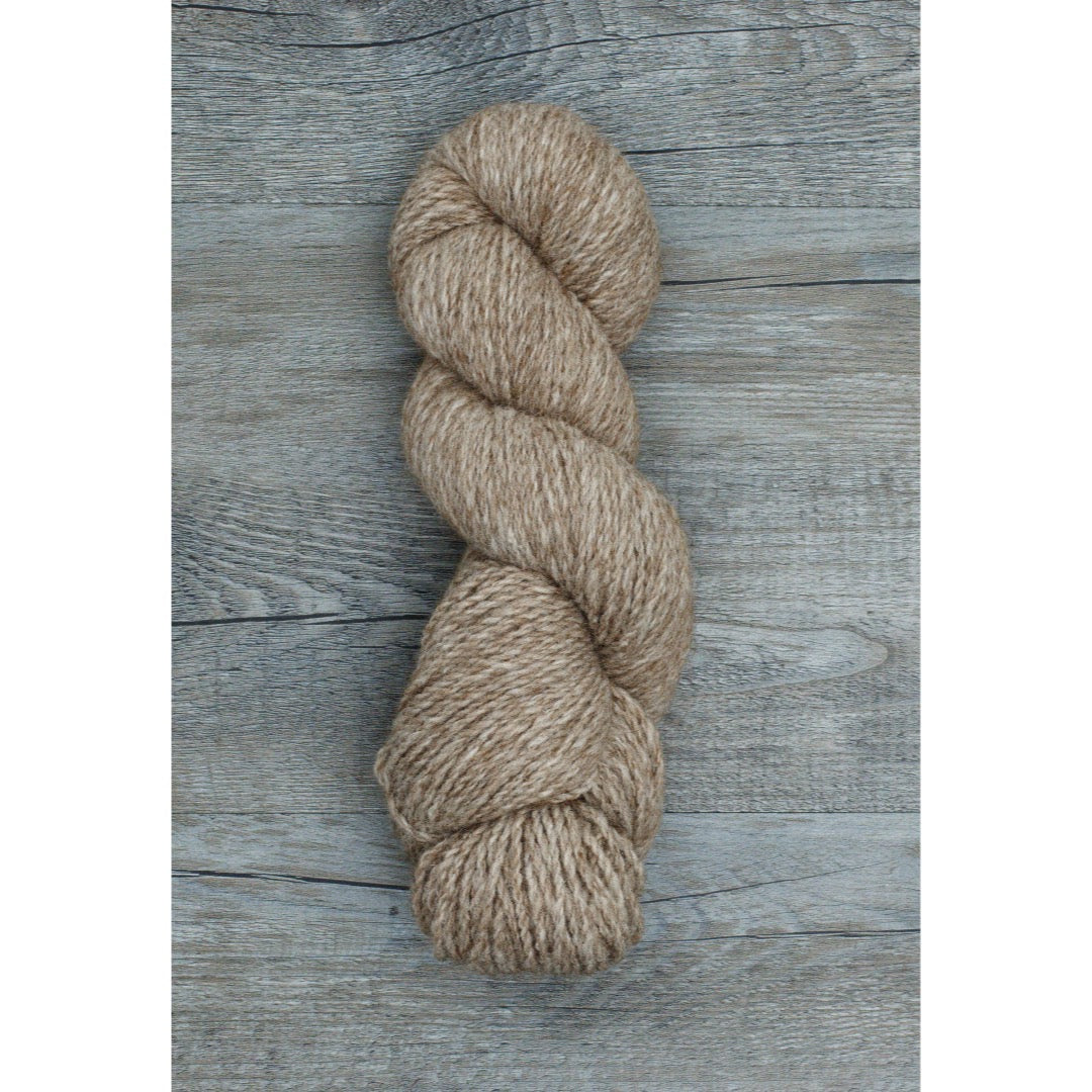 One hank of Copaca worsted in light ginger brown