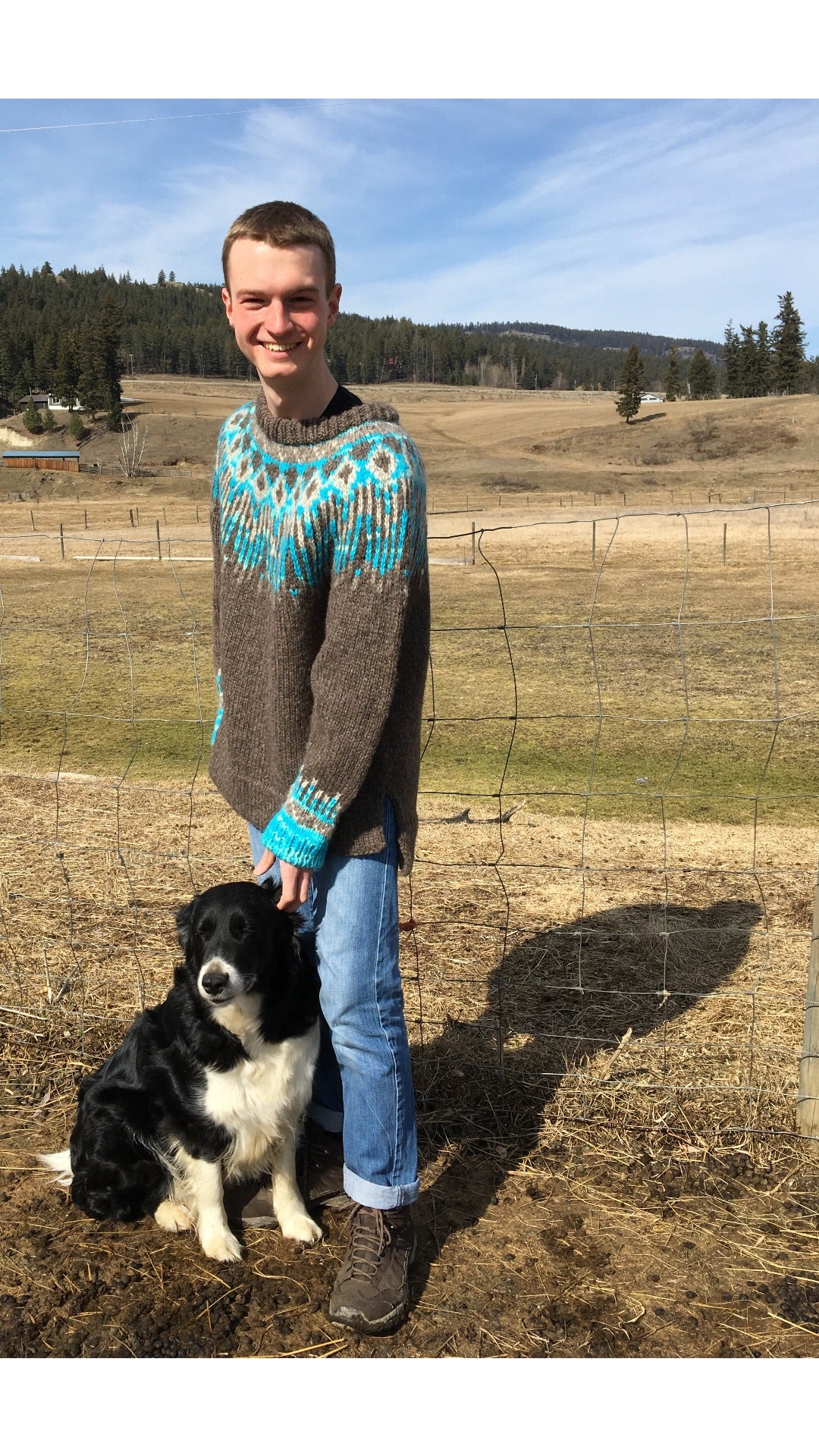 Model wearing multi coloured sweater in Roram Bulky yarn