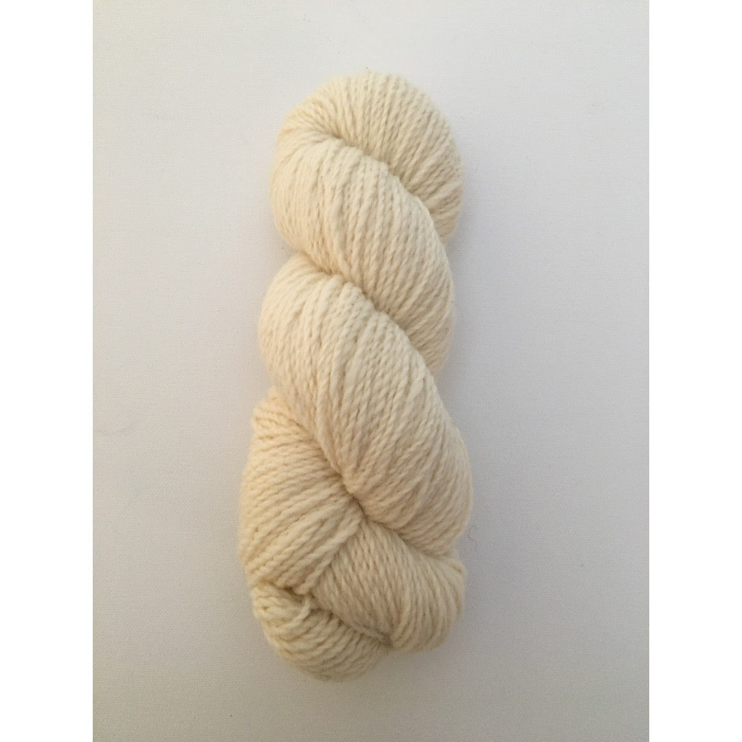 One hank of creamy white Corriedale worsted weight yarn