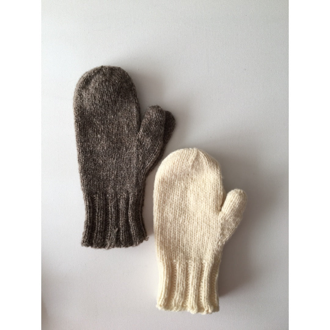 Two pairs of mittens knit up in Romney and Corriedale breed-specific worsted weight yarns