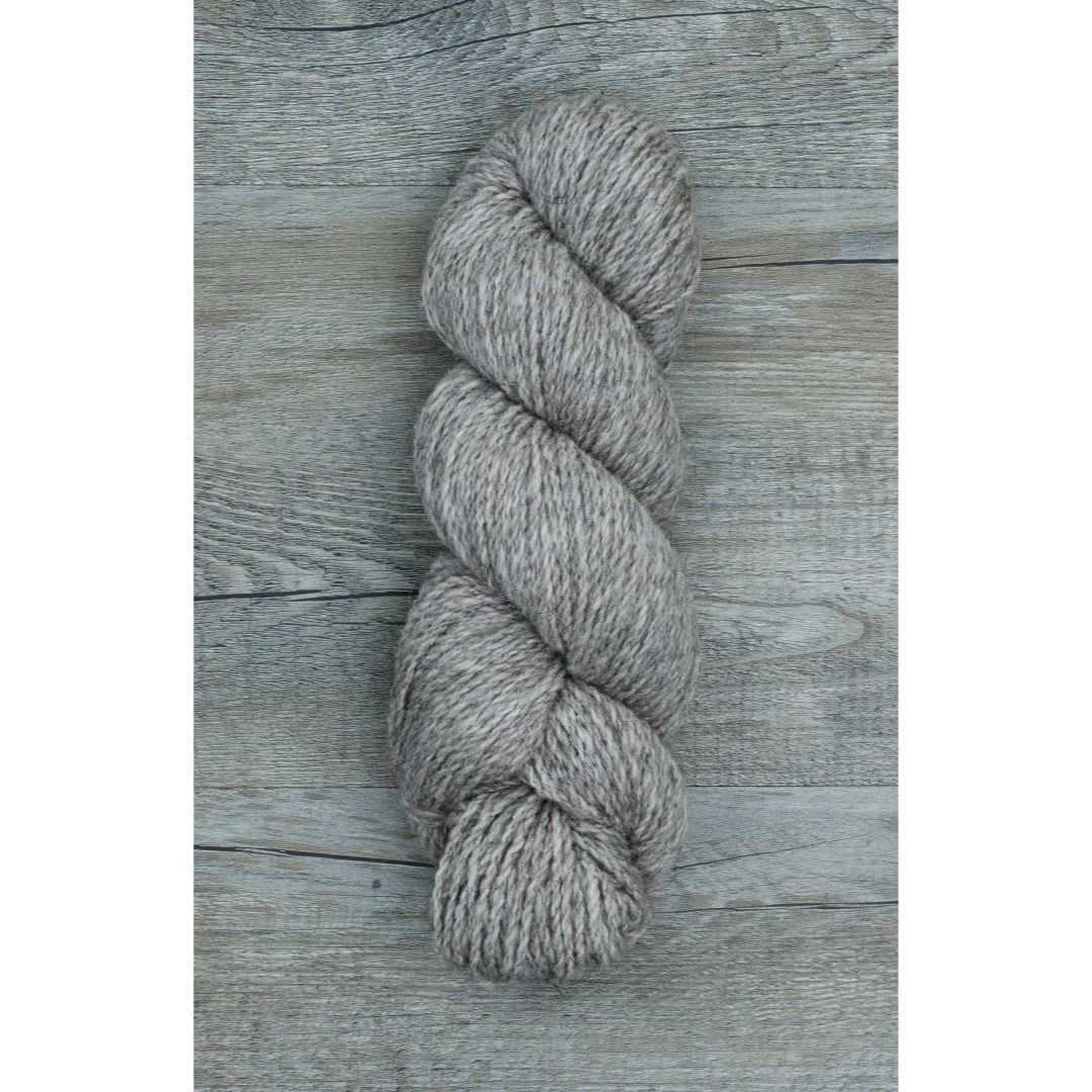 One hank of cool light grey Ramo Worsted weight yarn