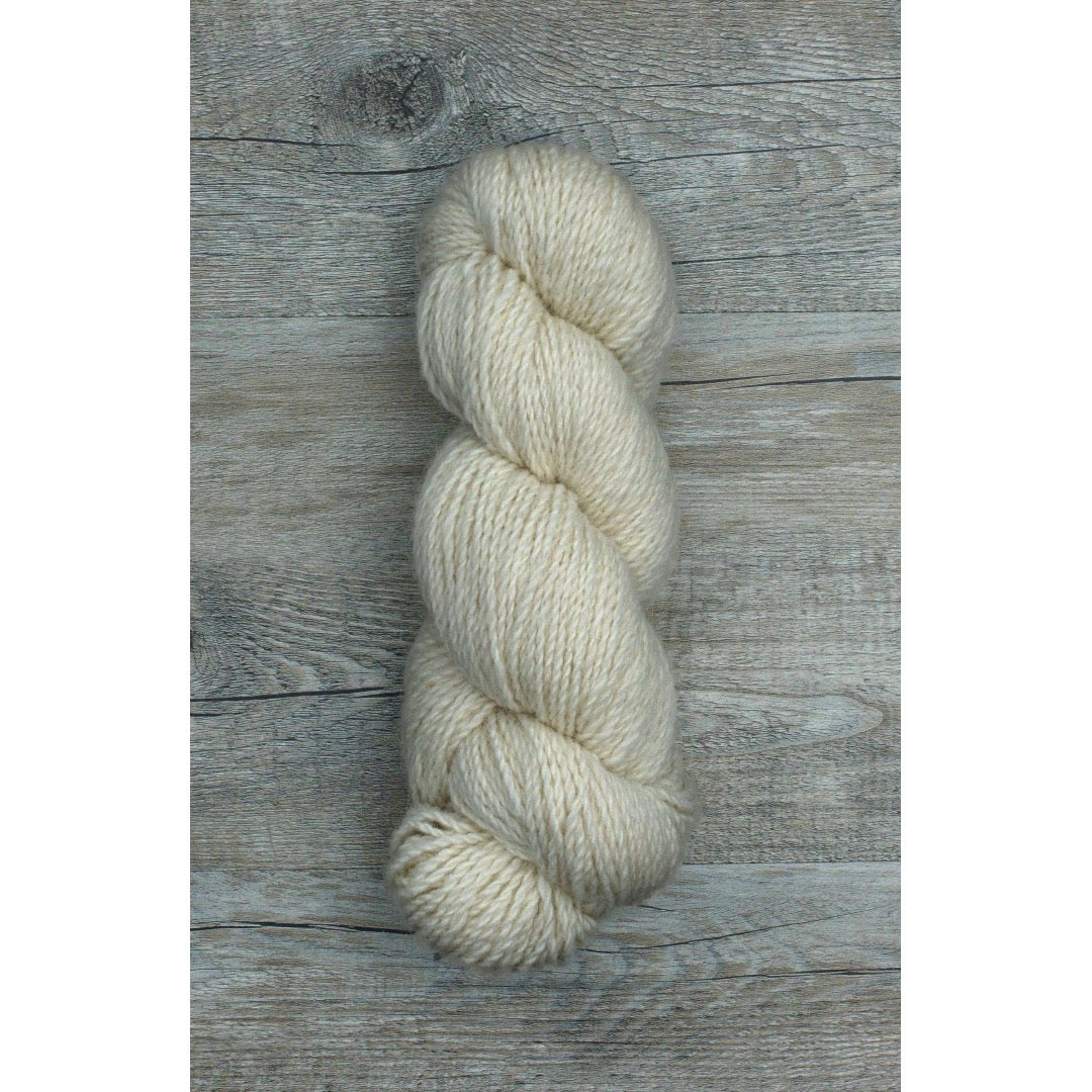 One hank of creamy white Ramo Worsted weight yarn