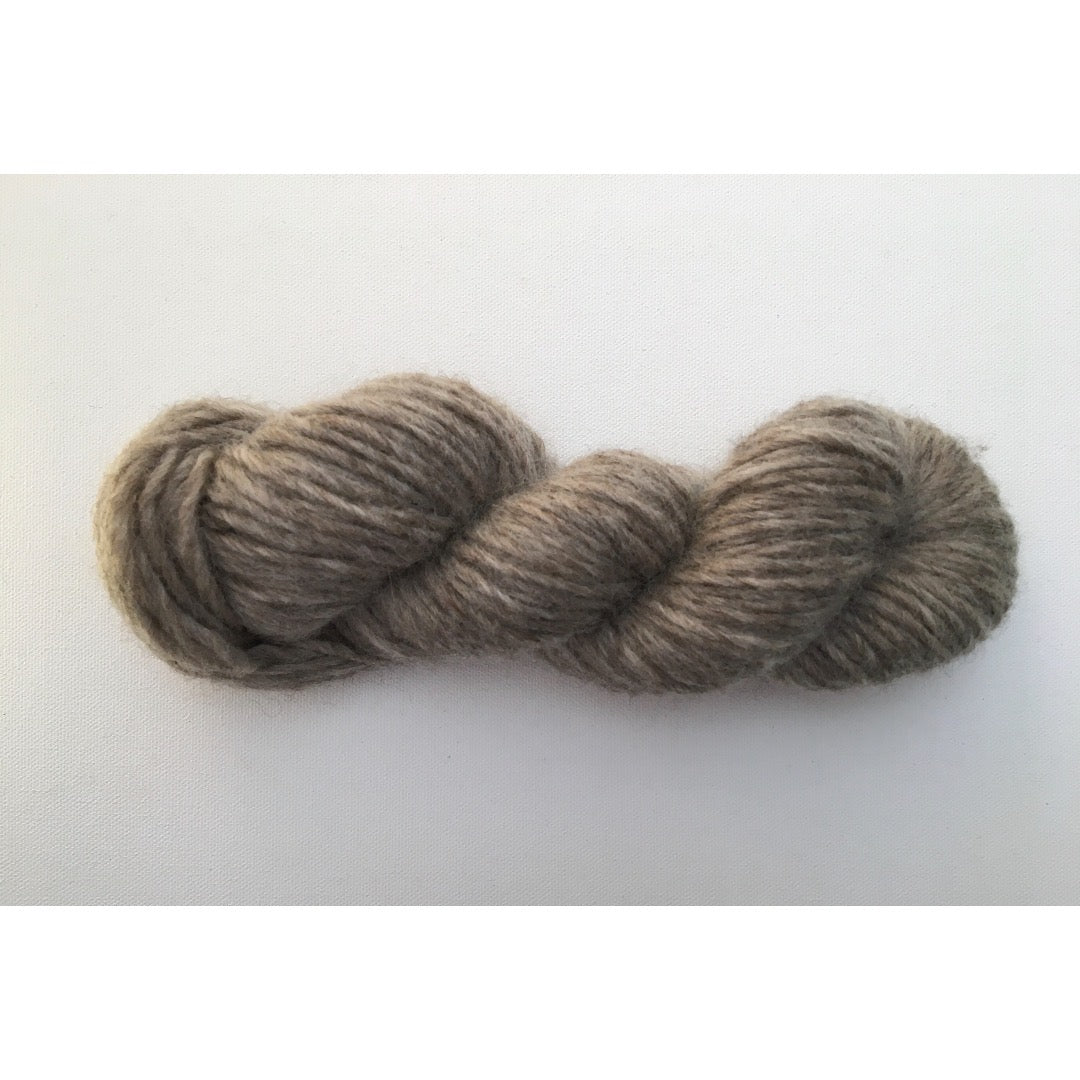 One natural coloured light brown hank of Romney Bulky yarn