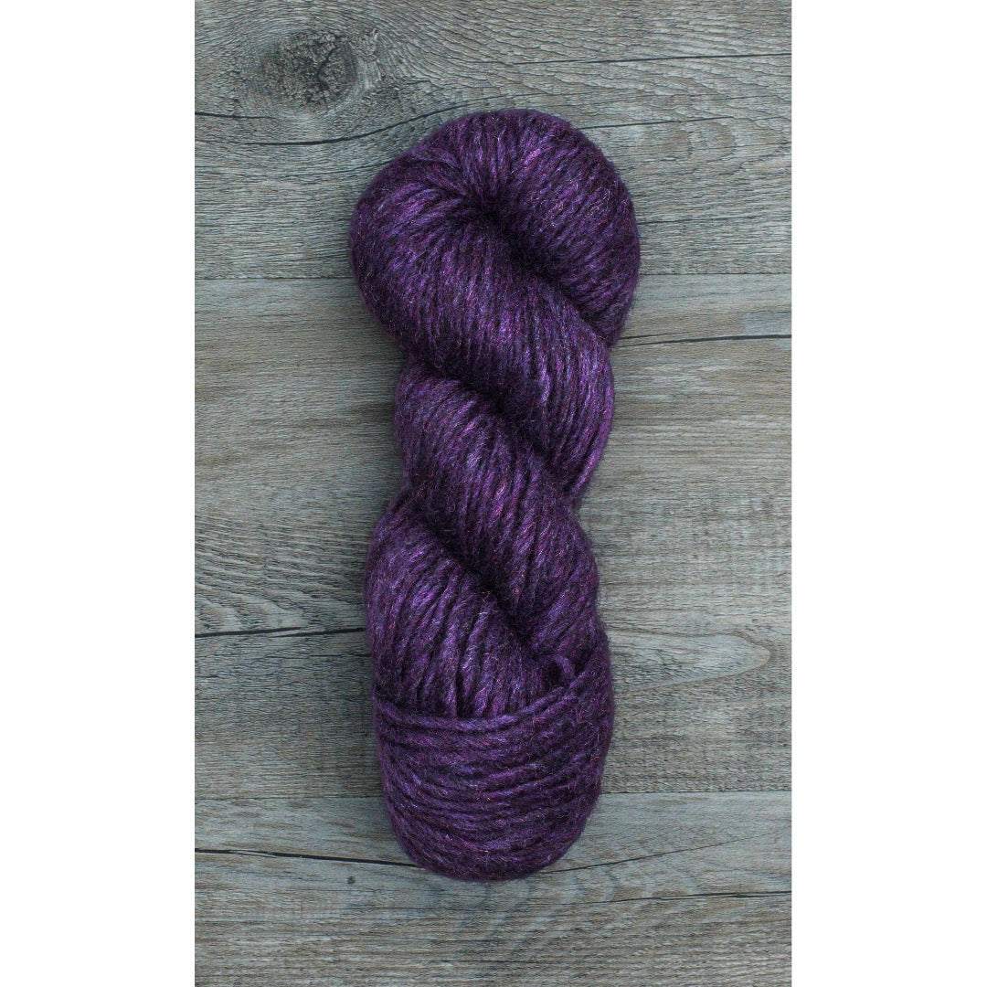 One hank of Romney Bulky yarn in Amethyst colorway.