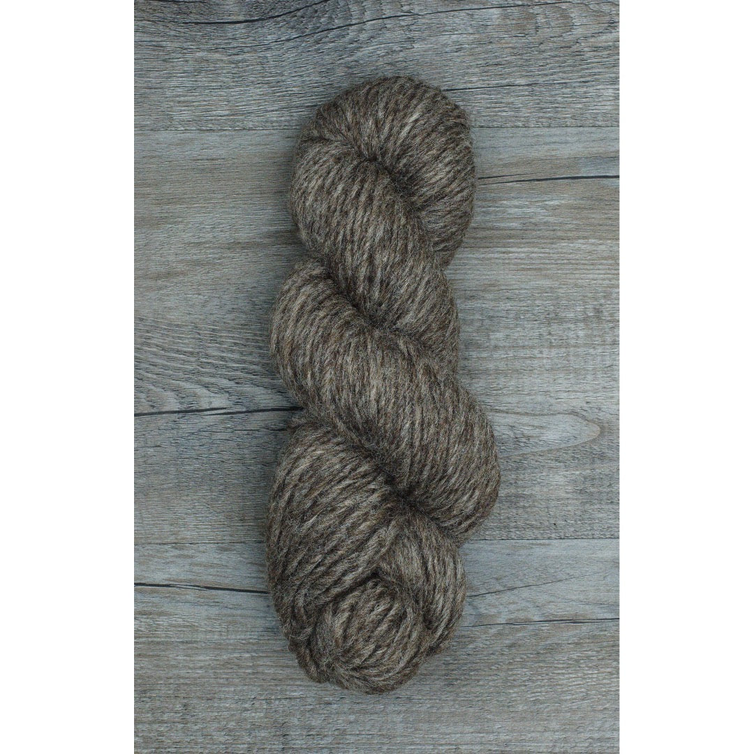 One hank of Romney Bulky yarn in Cocoa colorway.