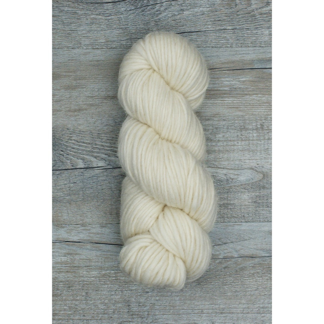 One hank of Romney Bulky yarn in Cream colorway.