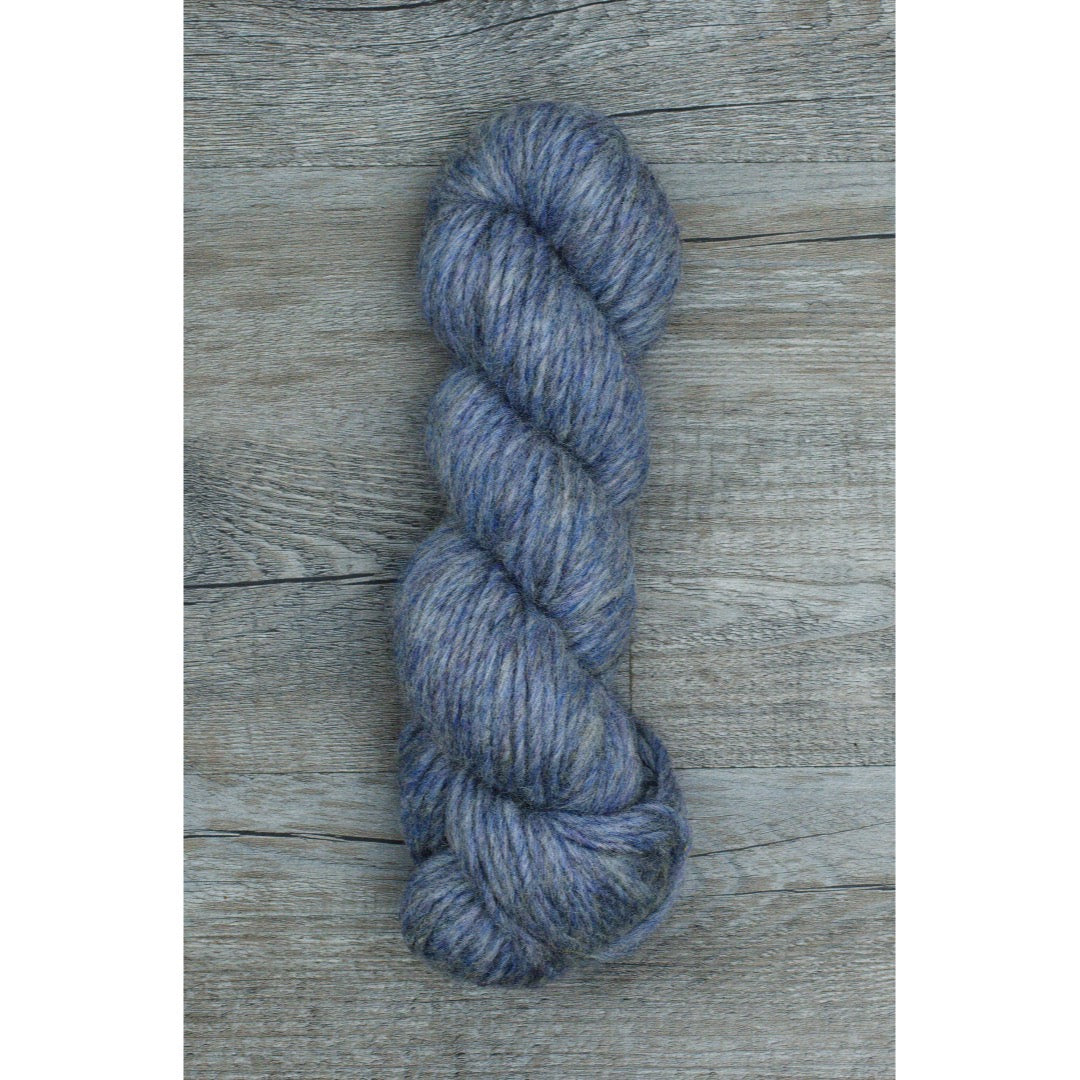 One hank of Romney Bulky yarn in Iris colorway.