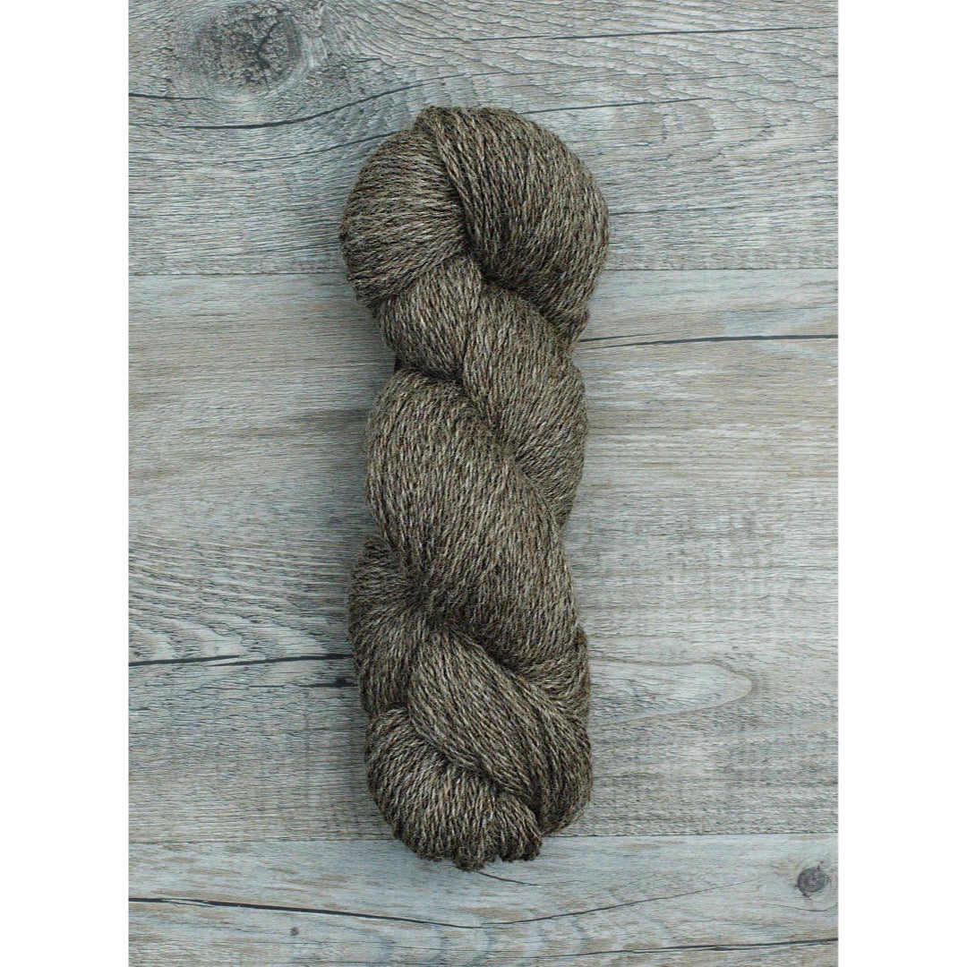 One half hank of dark grey light worsted yarn