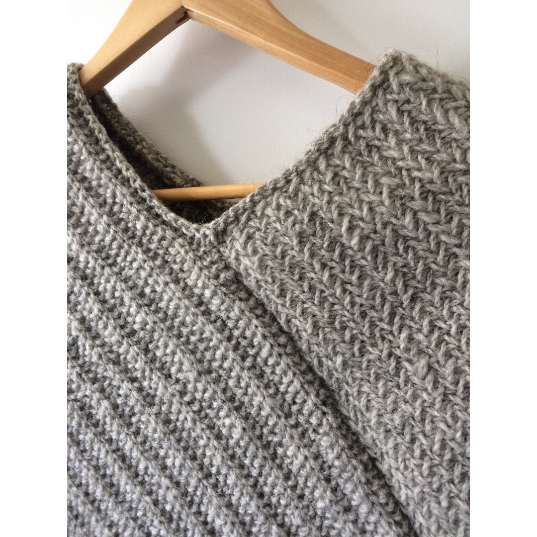 Close up of poncho's neckline